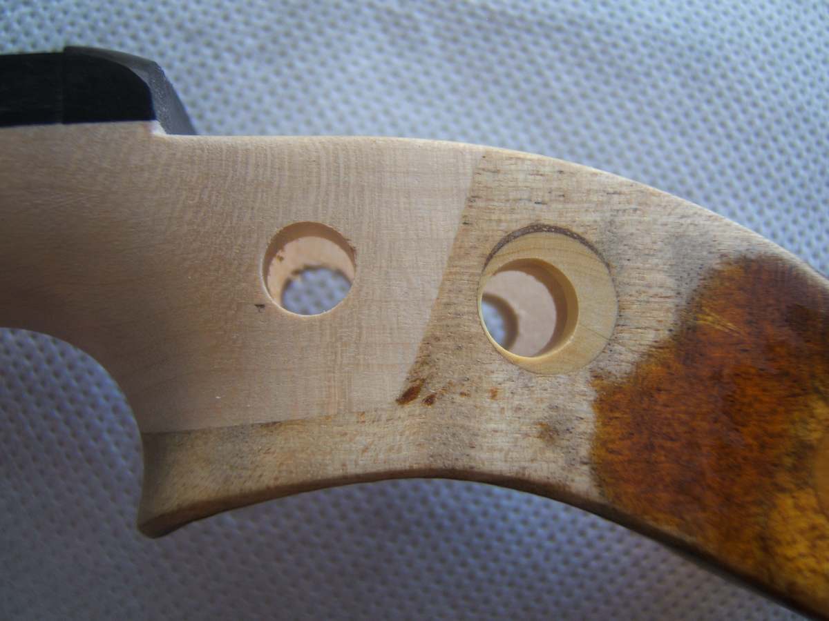New bushings fitted in the pegbox of a violin